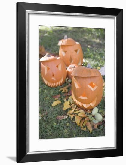 Carved Pumpkin Faces in Garden-Foodcollection-Framed Photographic Print