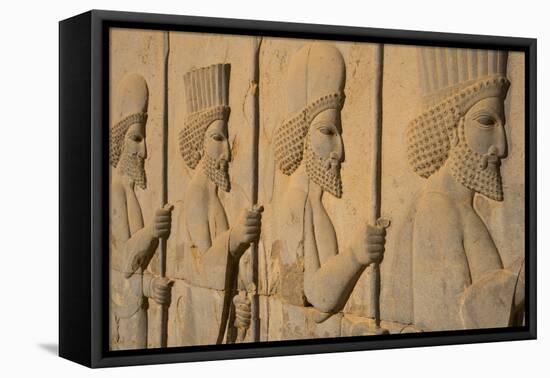 Carved relief of Royal Persian Guards, Apadana Palace, Persepolis, UNESCO World Heritage Site, Iran-James Strachan-Framed Premier Image Canvas