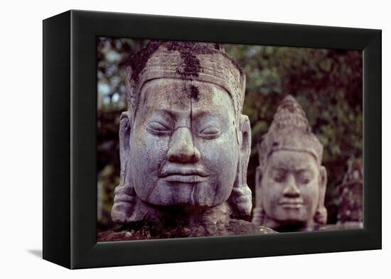 Carved Stone Statues Aligned at South Gate to Angkor Thom-Simon Montgomery-Framed Premier Image Canvas