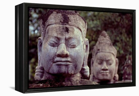 Carved Stone Statues Aligned at South Gate to Angkor Thom-Simon Montgomery-Framed Premier Image Canvas