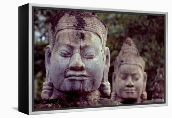 Carved Stone Statues Aligned at South Gate to Angkor Thom-Simon Montgomery-Framed Premier Image Canvas