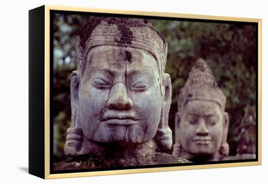 Carved Stone Statues Aligned at South Gate to Angkor Thom-Simon Montgomery-Framed Premier Image Canvas
