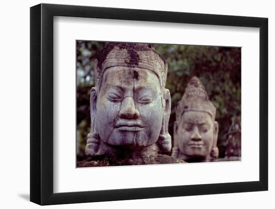 Carved Stone Statues Aligned at South Gate to Angkor Thom-Simon Montgomery-Framed Photographic Print