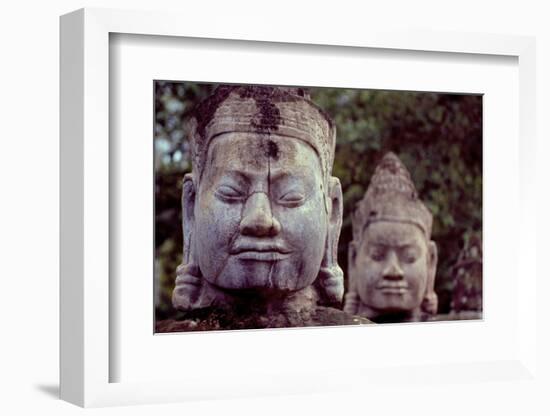 Carved Stone Statues Aligned at South Gate to Angkor Thom-Simon Montgomery-Framed Photographic Print