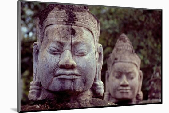 Carved Stone Statues Aligned at South Gate to Angkor Thom-Simon Montgomery-Mounted Photographic Print