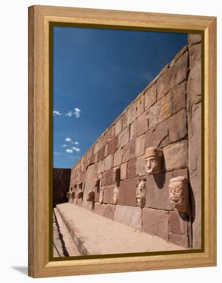 Carved Stone Tenon-Heads in a Wall of a Semi-Subterranean Temple in Tiwanaku-Alex Saberi-Framed Premier Image Canvas