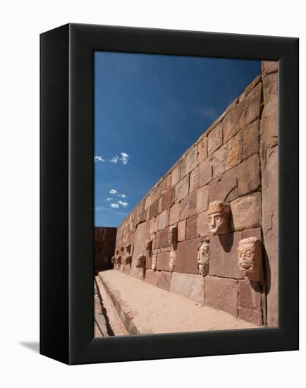 Carved Stone Tenon-Heads in a Wall of a Semi-Subterranean Temple in Tiwanaku-Alex Saberi-Framed Premier Image Canvas