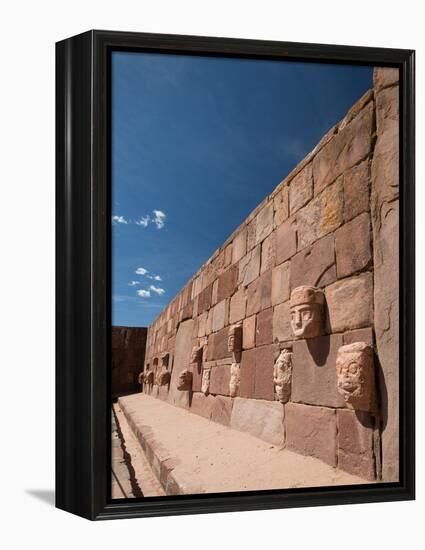 Carved Stone Tenon-Heads in a Wall of a Semi-Subterranean Temple in Tiwanaku-Alex Saberi-Framed Premier Image Canvas