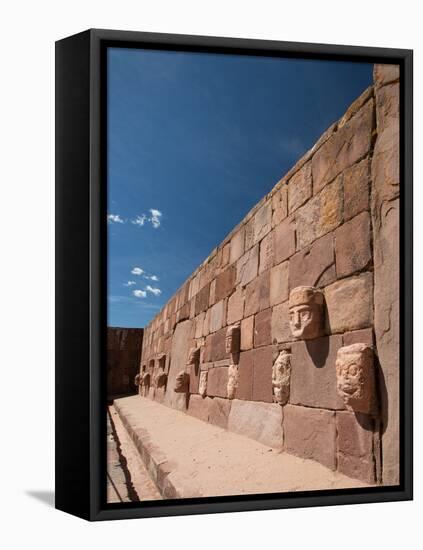 Carved Stone Tenon-Heads in a Wall of a Semi-Subterranean Temple in Tiwanaku-Alex Saberi-Framed Premier Image Canvas