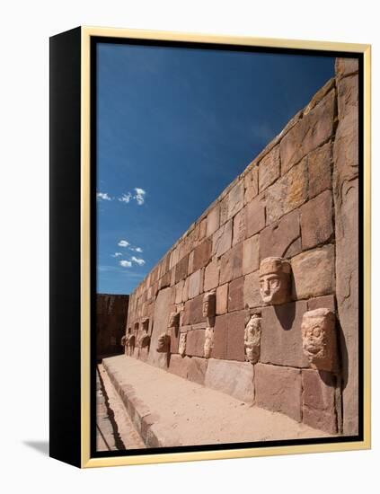 Carved Stone Tenon-Heads in a Wall of a Semi-Subterranean Temple in Tiwanaku-Alex Saberi-Framed Premier Image Canvas