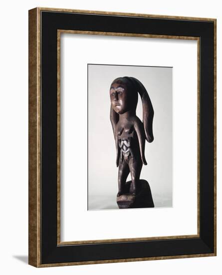 Carved wooden figure of a Sea Mother, possibly Kwakiutl, north-west coast of America-Werner Forman-Framed Photographic Print