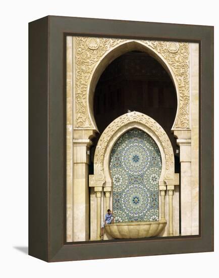 Casablanca a Visitor Is Dwarfed by the Towering Mosaic Tilework of the Hassan Ii Mosque, Morocco-Andrew Watson-Framed Premier Image Canvas