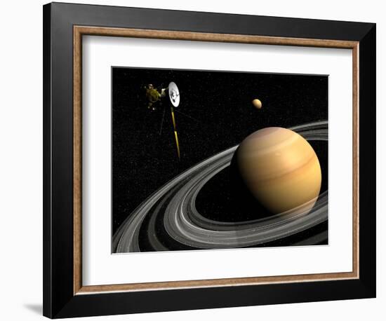 Cassini Spacecraft Orbiting Saturn and And its Moon Titan-null-Framed Art Print