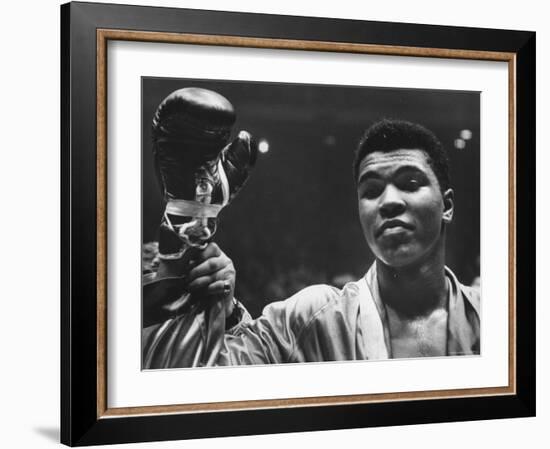 Cassius Clay After Defeating Doug Jones in Close Heavyweight Bout, in Madison Square Garden-George Silk-Framed Premium Photographic Print