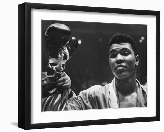 Cassius Clay After Defeating Doug Jones in Close Heavyweight Bout, in Madison Square Garden-George Silk-Framed Premium Photographic Print