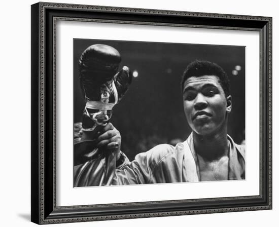 Cassius Clay After Defeating Doug Jones in Close Heavyweight Bout, in Madison Square Garden-George Silk-Framed Premium Photographic Print