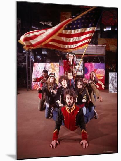 Cast of Theater Production of the Musical "Hair" under Large Waving American Flag-Ralph Morse-Mounted Premium Photographic Print