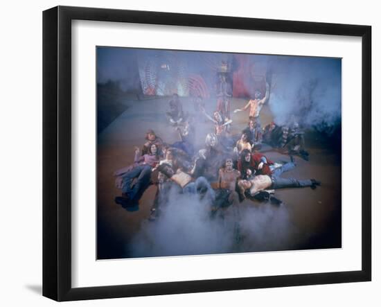 Cast Singing and Lolling About on Incense-Smoke-Filled Stage in Scene from Musical "Hair"-Ralph Morse-Framed Photographic Print