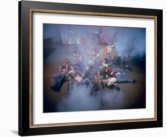 Cast Singing and Lolling About on Incense-Smoke-Filled Stage in Scene from Musical "Hair"-Ralph Morse-Framed Photographic Print