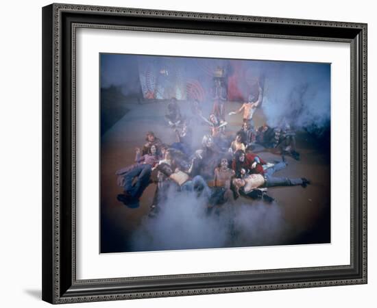 Cast Singing and Lolling About on Incense-Smoke-Filled Stage in Scene from Musical "Hair"-Ralph Morse-Framed Photographic Print