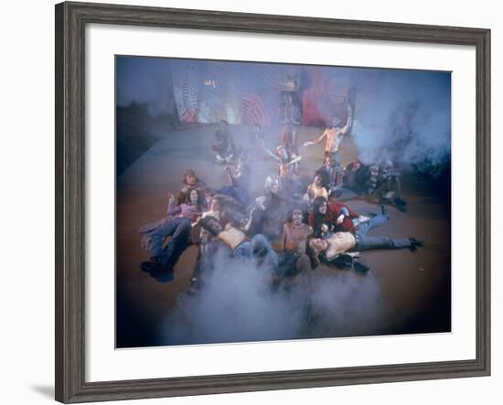 Cast Singing and Lolling About on Incense-Smoke-Filled Stage in Scene from Musical "Hair"-Ralph Morse-Framed Photographic Print