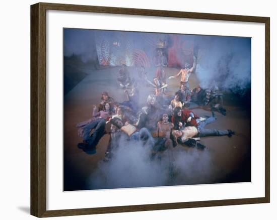 Cast Singing and Lolling About on Incense-Smoke-Filled Stage in Scene from Musical "Hair"-Ralph Morse-Framed Photographic Print