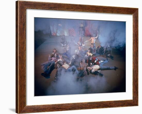 Cast Singing and Lolling About on Incense-Smoke-Filled Stage in Scene from Musical "Hair"-Ralph Morse-Framed Photographic Print