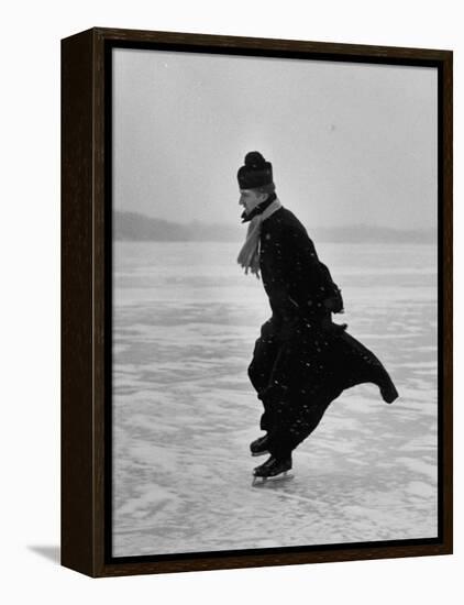 Catholic Priest Ice Skating. from Photo Essay Re Polish American Community-John Dominis-Framed Premier Image Canvas