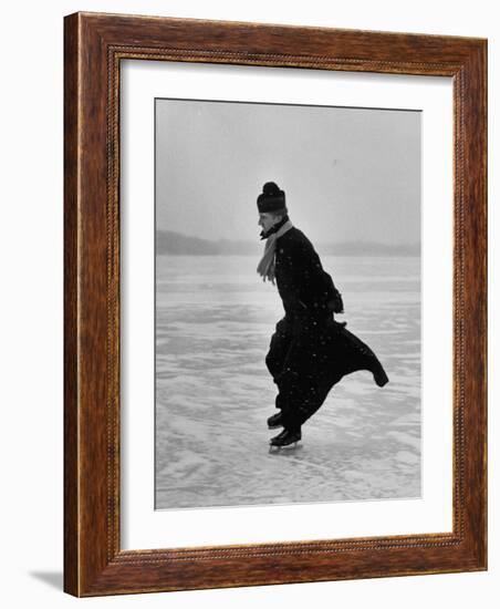 Catholic Priest Ice Skating. from Photo Essay Re Polish American Community-John Dominis-Framed Photographic Print