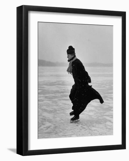 Catholic Priest Ice Skating. from Photo Essay Re Polish American Community-John Dominis-Framed Photographic Print