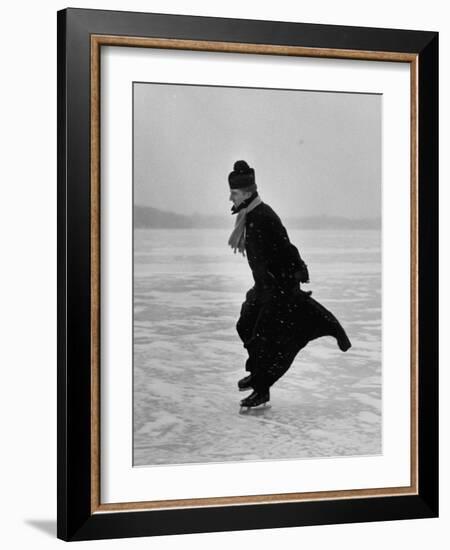 Catholic Priest Ice Skating. from Photo Essay Re Polish American Community-John Dominis-Framed Photographic Print