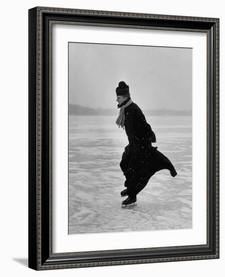 Catholic Priest Ice Skating. from Photo Essay Re Polish American Community-John Dominis-Framed Photographic Print