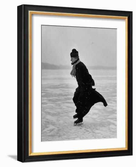 Catholic Priest Ice Skating. from Photo Essay Re Polish American Community-John Dominis-Framed Photographic Print