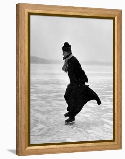 Catholic Priest Ice Skating-John Dominis-Framed Premier Image Canvas