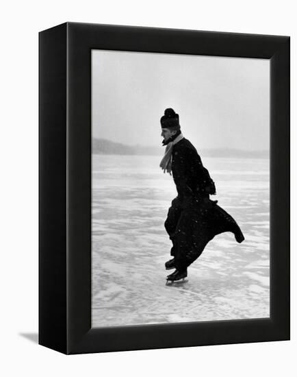 Catholic Priest Ice Skating-John Dominis-Framed Premier Image Canvas