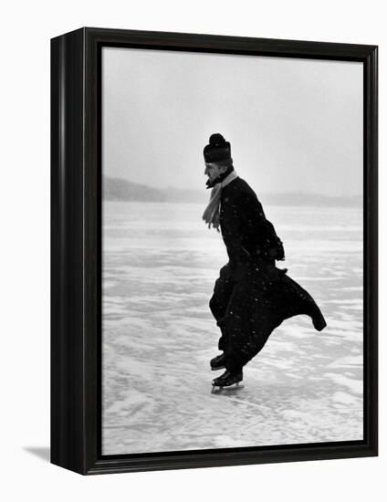 Catholic Priest Ice Skating-John Dominis-Framed Premier Image Canvas