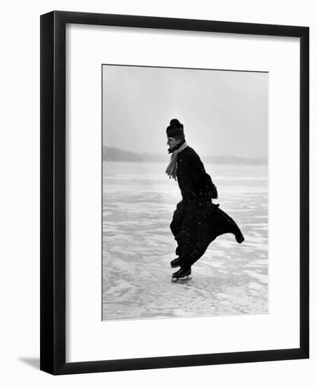 Catholic Priest Ice Skating-John Dominis-Framed Photographic Print