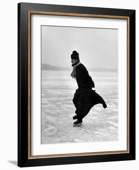 Catholic Priest Ice Skating-John Dominis-Framed Photographic Print