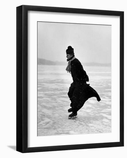 Catholic Priest Ice Skating-John Dominis-Framed Photographic Print