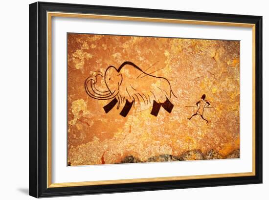 Cave Painting Of Primitive Man Hunting For Mammoth-Nomad Soul-Framed Art Print