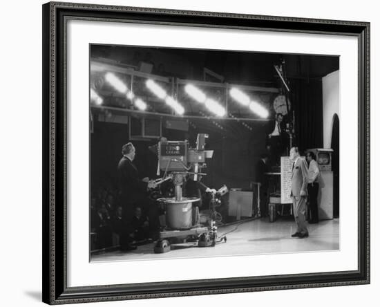 CBS Cameraman Filming Ed Sullivan During "The Ed Sullivan Show," Cue Cards are Visible Behind Him-Arthur Schatz-Framed Premium Photographic Print