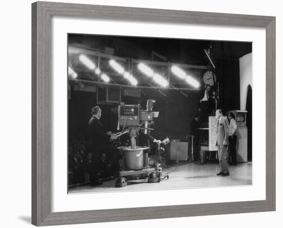 CBS Cameraman Filming Ed Sullivan During "The Ed Sullivan Show," Cue Cards are Visible Behind Him-Arthur Schatz-Framed Premium Photographic Print