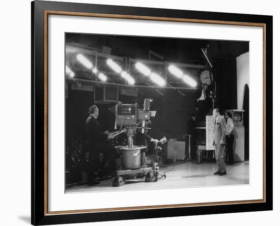 CBS Cameraman Filming Ed Sullivan During "The Ed Sullivan Show," Cue Cards are Visible Behind Him-Arthur Schatz-Framed Premium Photographic Print