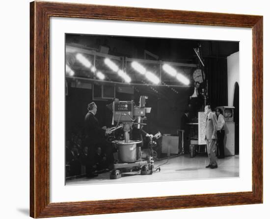 CBS Cameraman Filming Ed Sullivan During "The Ed Sullivan Show," Cue Cards are Visible Behind Him-Arthur Schatz-Framed Premium Photographic Print