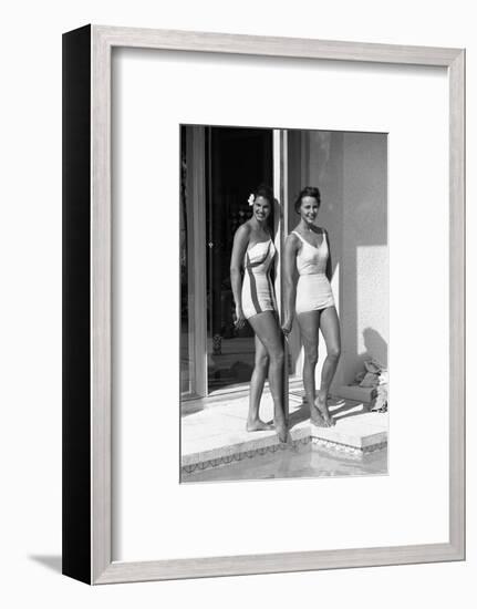 Celia Kyllingstad (R) and Carol Hall (L), at a Private Pool, Seattle, Washington, 1960-Allan Grant-Framed Photographic Print