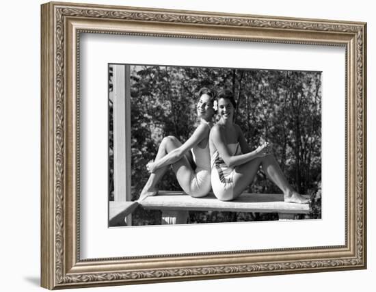 Celia Kyllingstad (R) and Carol Hall (L), at a Private Pool, Seattle, Washington, 1960-Allan Grant-Framed Photographic Print