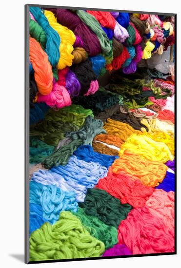 Central America, Guatemala, Chichicastenango. Colorful fabrics being sold at market day-Bill Bachmann-Mounted Photographic Print