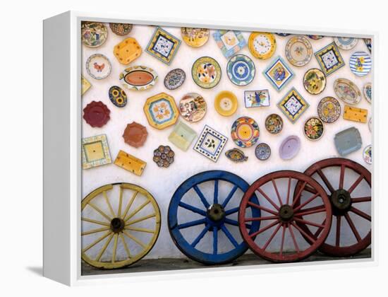 Ceramic Plates and Wagon Wheels, Algarve, Portugal-Merrill Images-Framed Premier Image Canvas