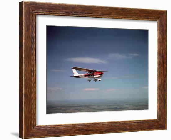 Cessna Skyhawk Flying-null-Framed Photographic Print