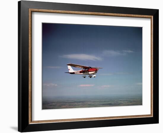 Cessna Skyhawk Flying-null-Framed Photographic Print